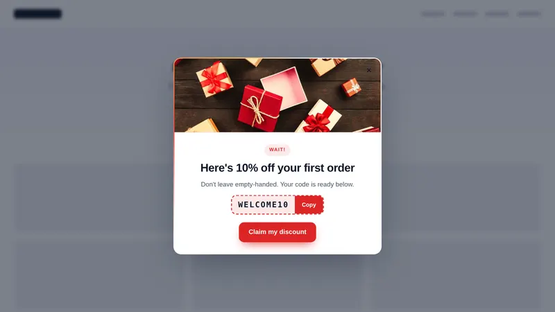 Exit-intent discount popup with a copyable code on a sample website